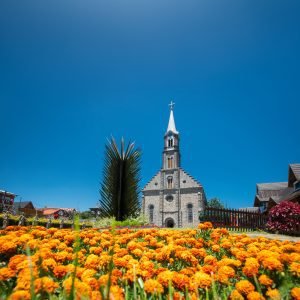 St. Peter's Parish and its beautiful flowered garden. Gramado Cathedral, Rio Grande do Sul, Brazil.